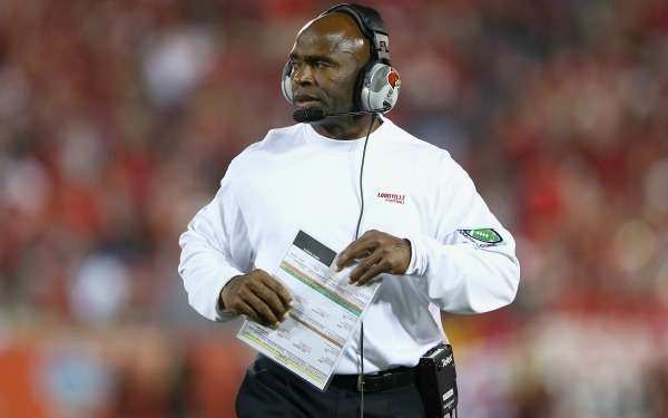 Louisville head coach Charlie Strong is reportedly being considered for the vacant Texas job. (Andy Lyons/Getty Images)